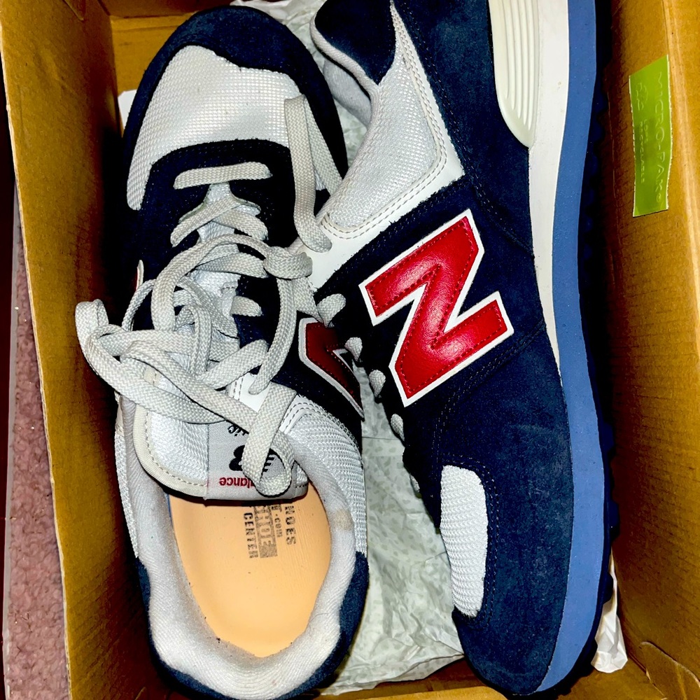 Slightly worn New Balance Classic 574